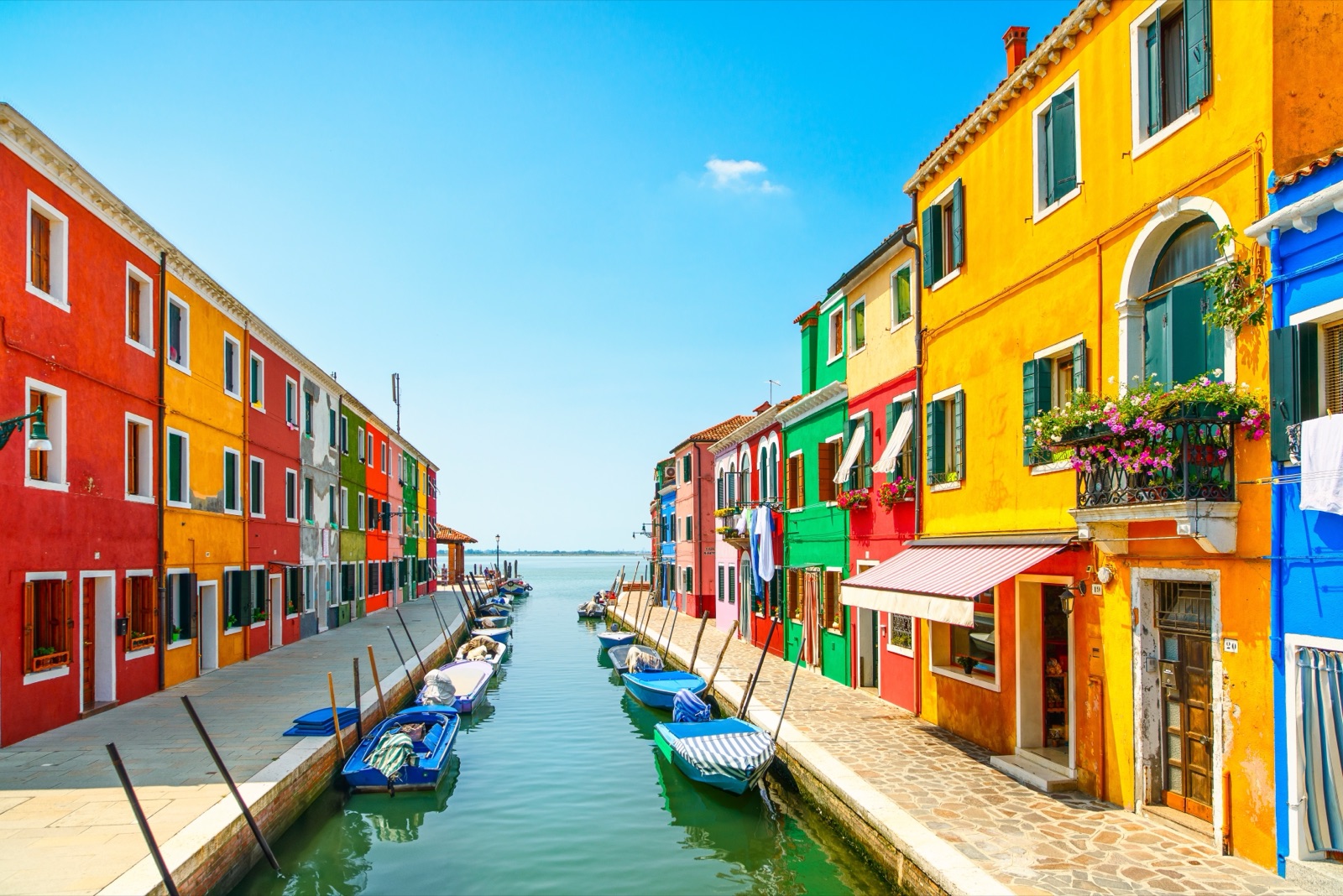 Boats moored on a Burano canal
